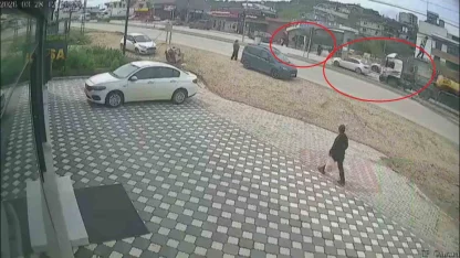 Karşıdan karşıya geçmek isteyen öğrencilere çarpmamak için sola manevra yapan iş makinesi yüklü tır sürücüsünün faciayı önlediği anlar kamerada