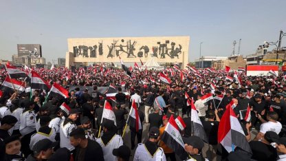 Bağdat’ta binlerce kişi İran’a destek için sokakları doldurdu