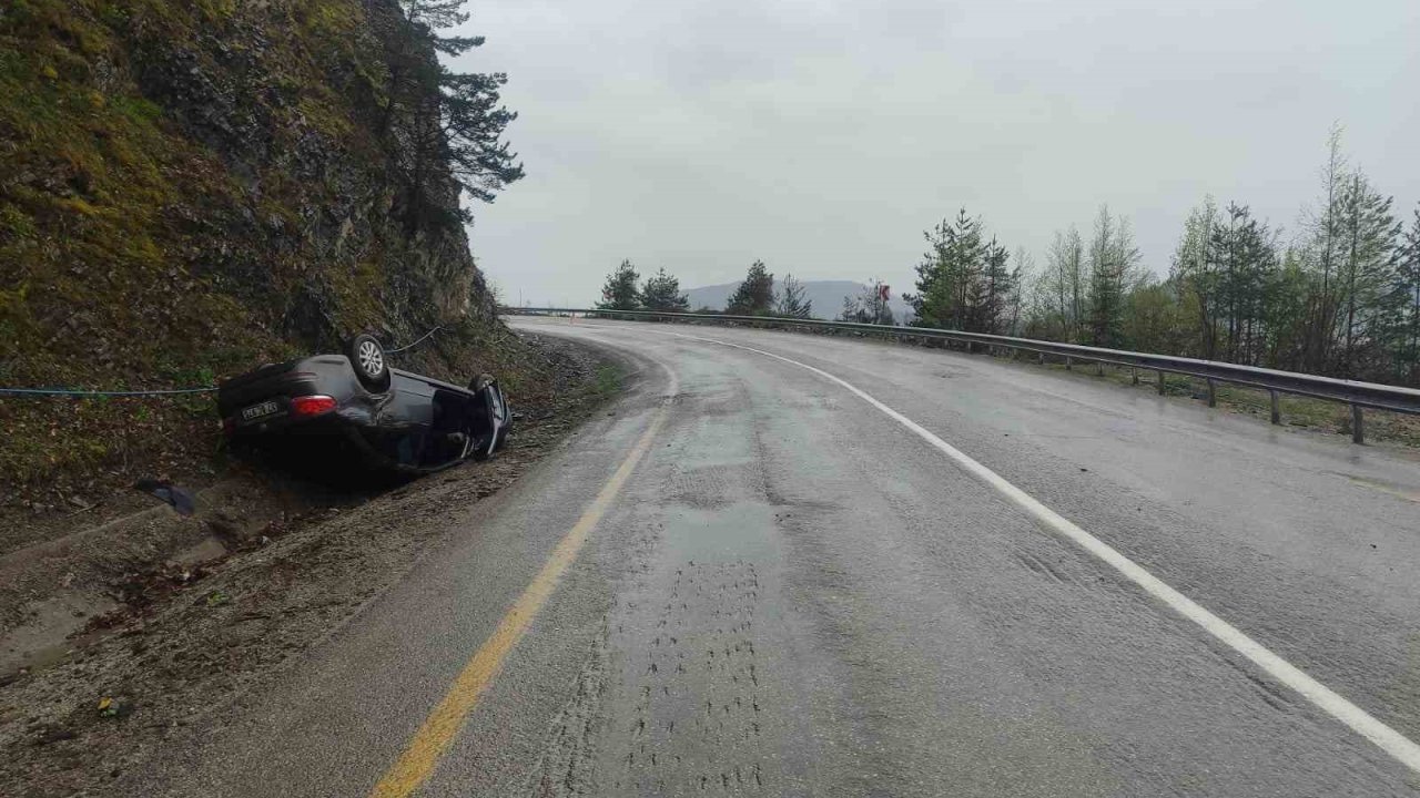 Takla atan otomobilden yara almadan kurtuldu